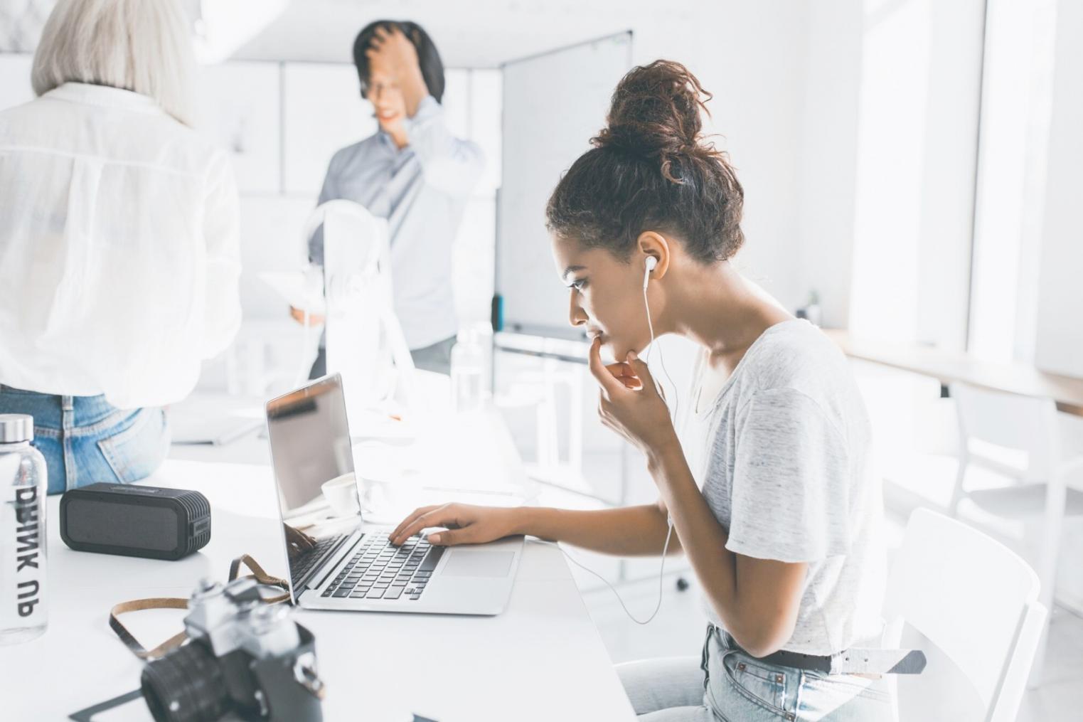 Financial analyst reviewing complex spreadsheet models during training session